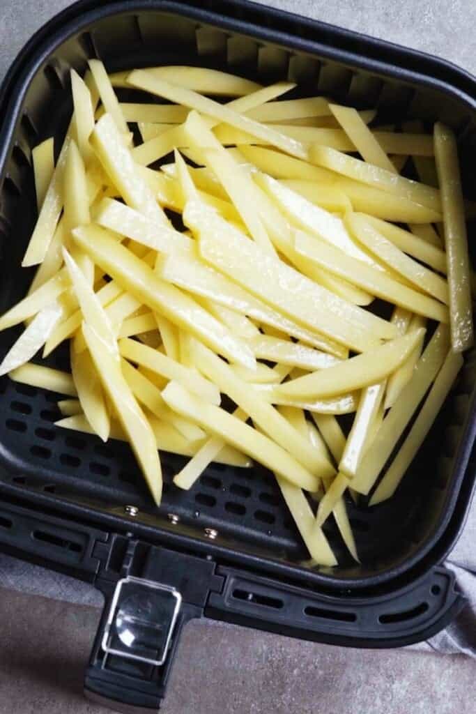 Raw potatoes for french fries in air fryer