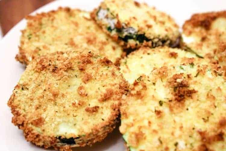Closeup of Air Fryer Zucchini Chips on white plate