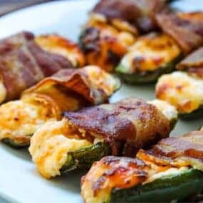 Bacon Wrapped Jalapeno Poppers on a white plate