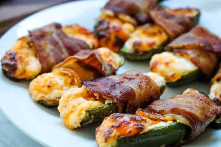 Bacon Wrapped Jalapeno Poppers on a white plate