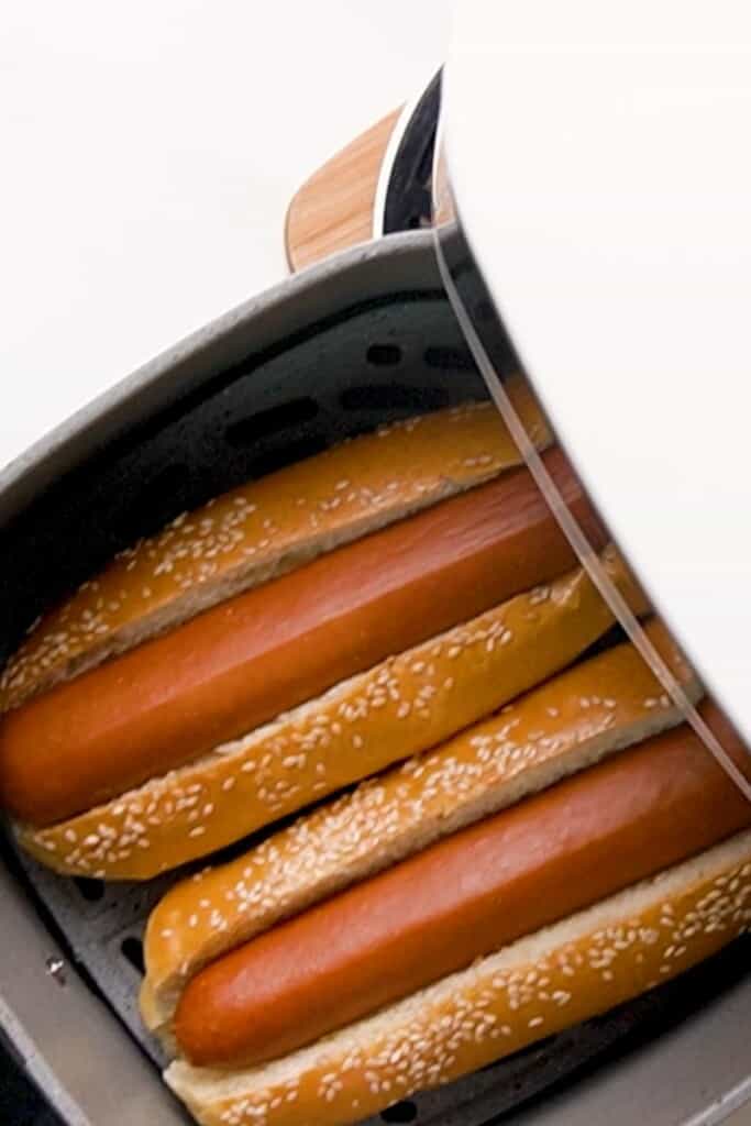 Hot Dogs in buns in air fryer basket