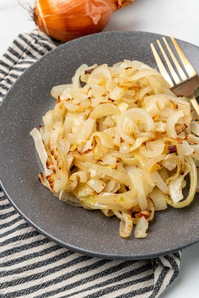 Air fryer onions on a grey plate