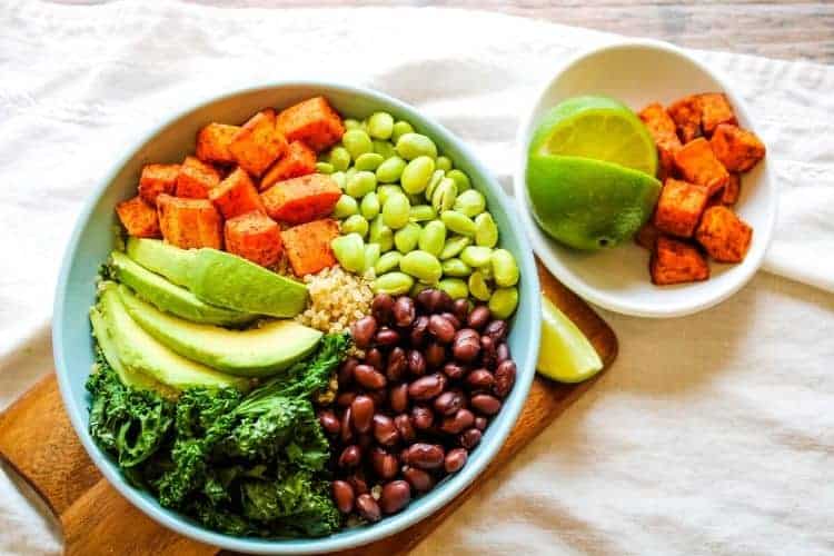 Sweet Potato Grain Bowl with a small bowl of Mexican sweet potatoes next to it with a lime