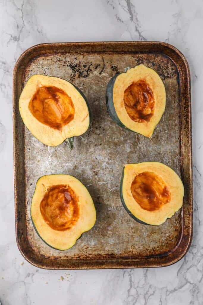 Acorn squash halves with brown sugar and butter basted on