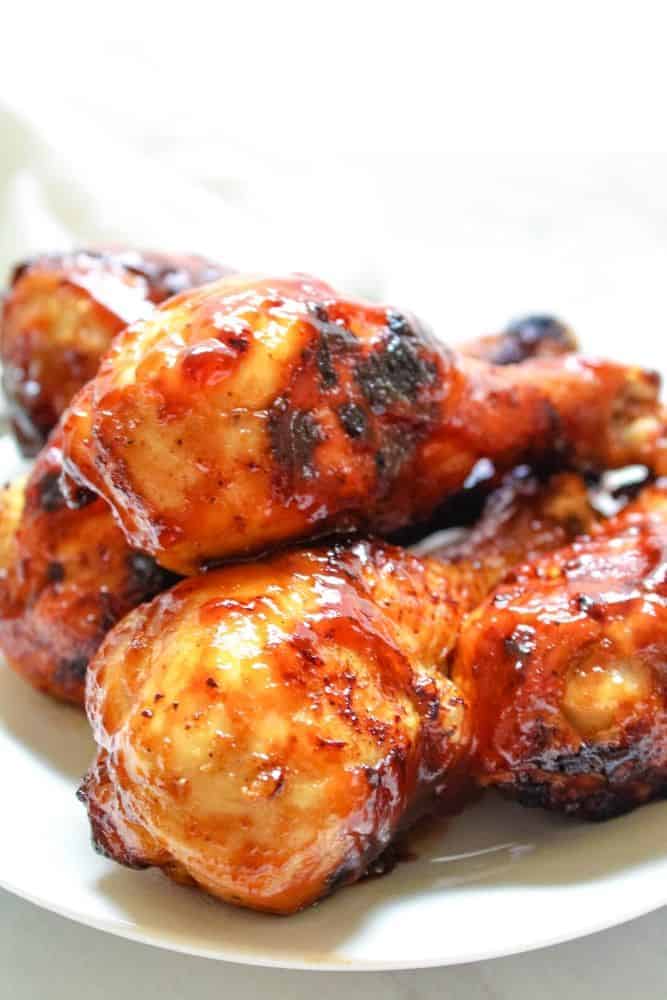 BBQ Drumsticks on a white plate