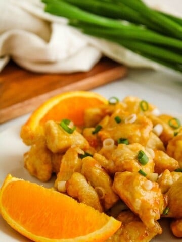 Air Fryer Orange Chicken with Oranges and Green Onions