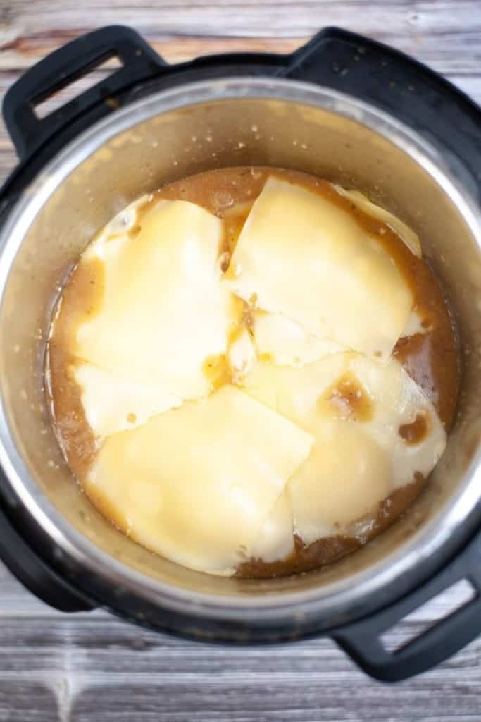 Title and Shown: Instant French Onion Chicken (on a white plate)