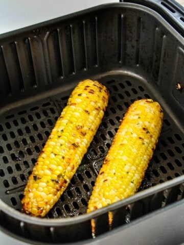 Roasted corn on the cob in air fryer basket