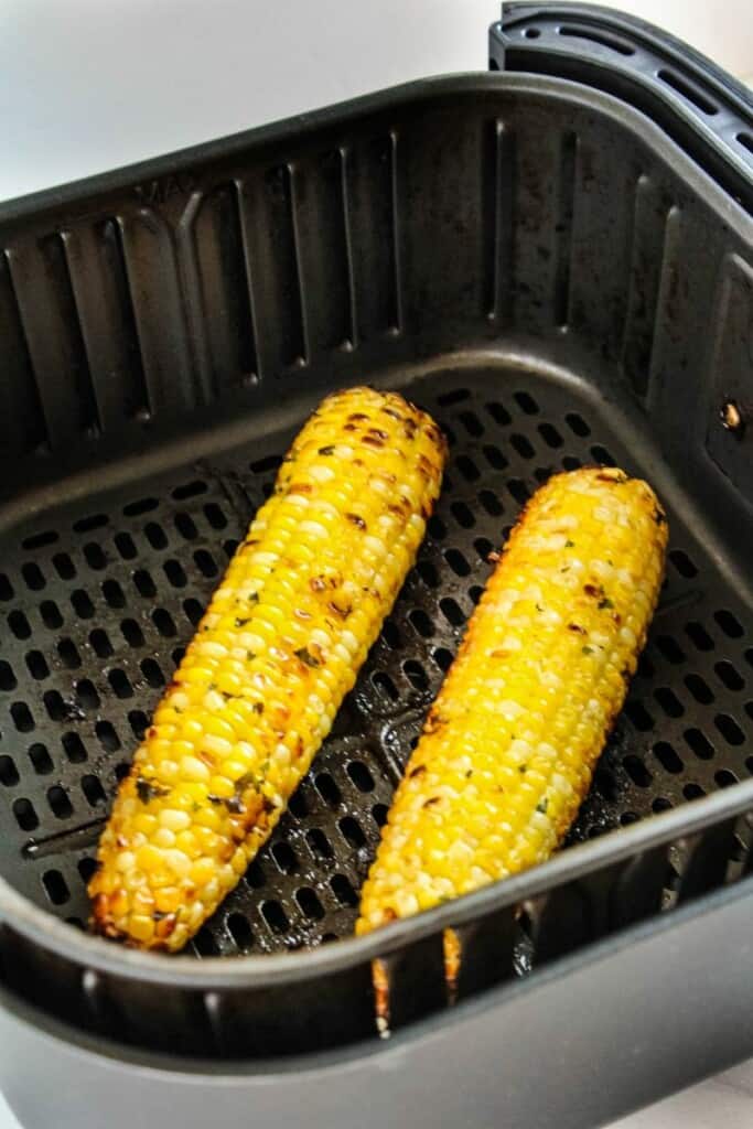 Roasted corn on the cob in air fryer basket