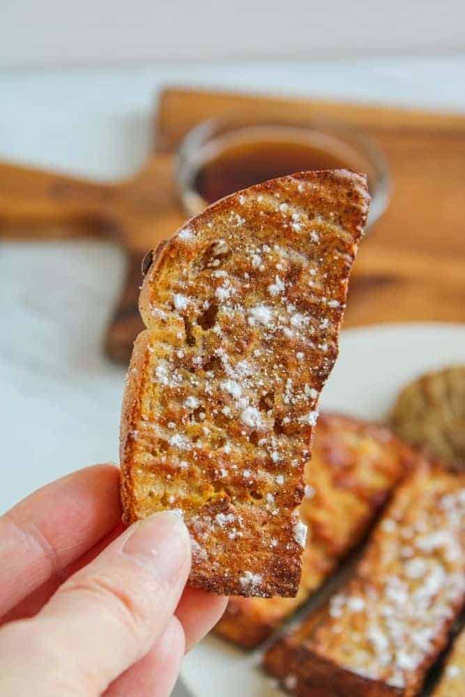 Closeup of Air Fried French Toast Stick in hand
