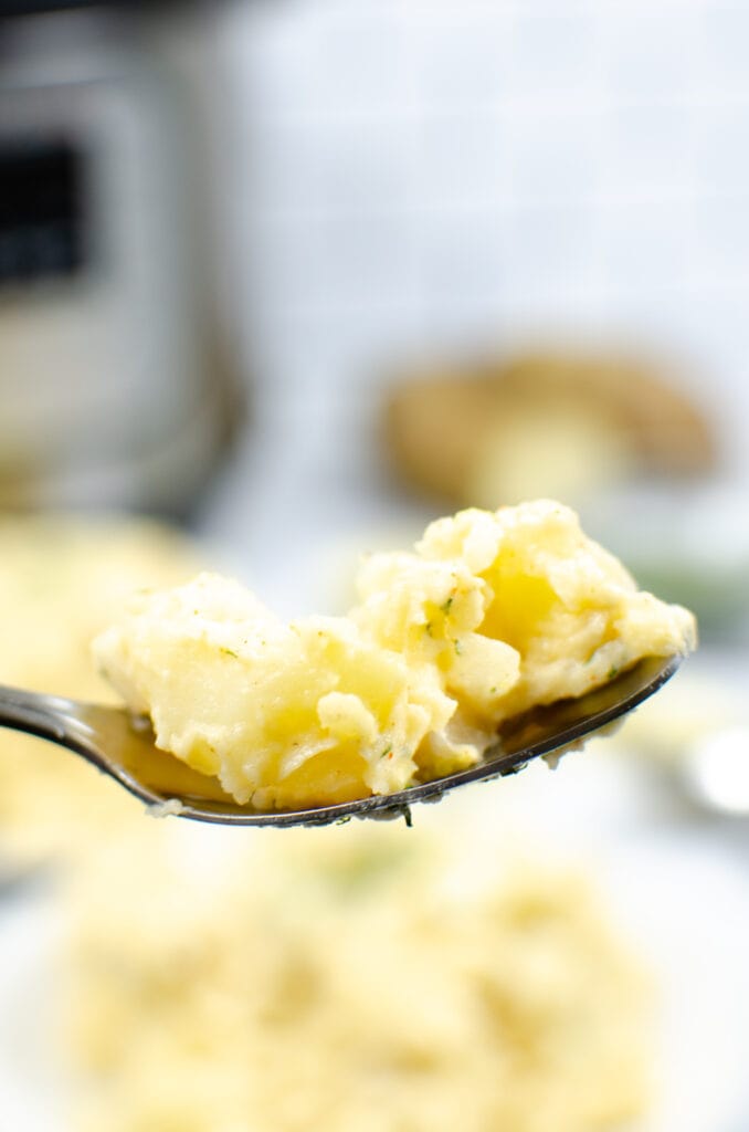 Creamy Instant Pot Potato Salad on a spoon