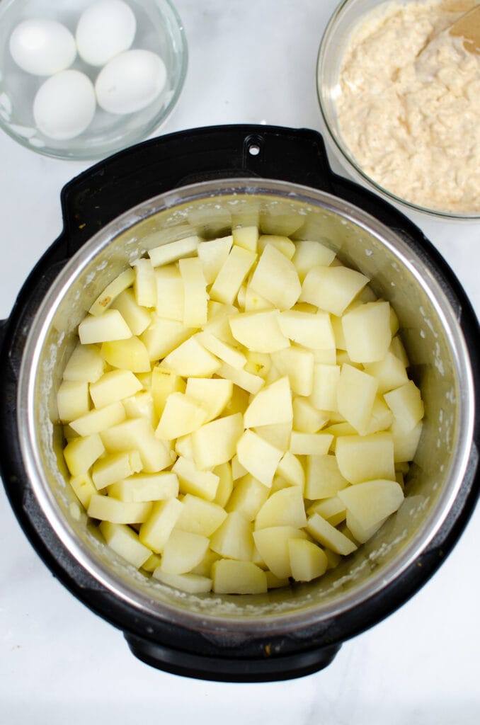 Potatoes chopped up into Instant Pot