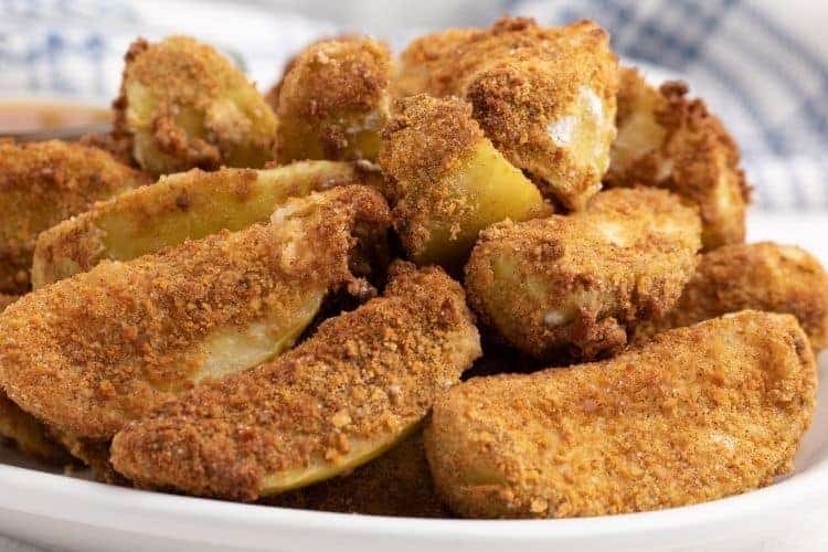 Closeup of air fryer apples on a white plate