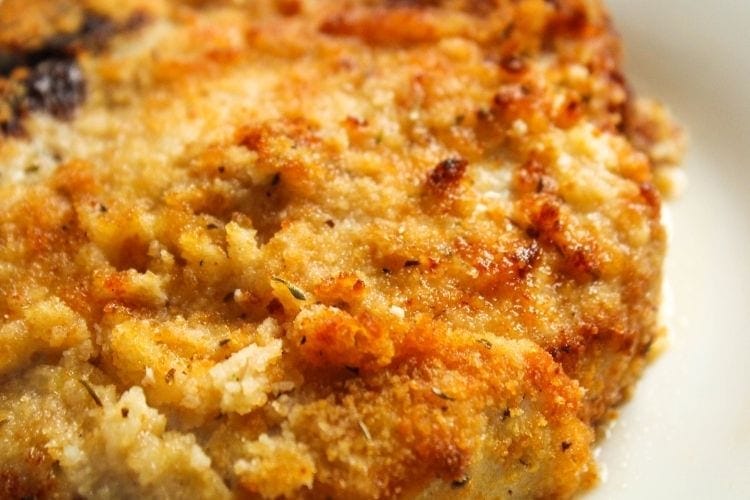 Closeup of golden brown crispy crusting on Air Fryer Breaded Pork Chop