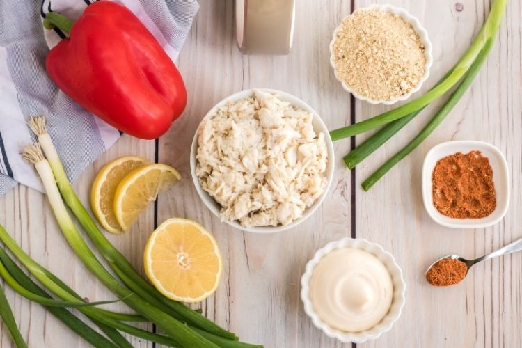 Ingredients in bowls needed to make crab cakes in the air fryer