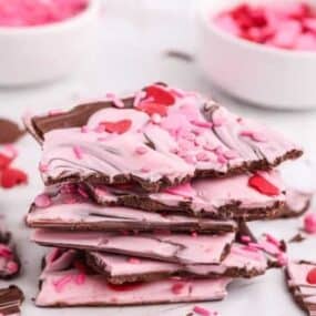 Pink Valentines Day Chocolate Bark with sprinkles and hearts on top