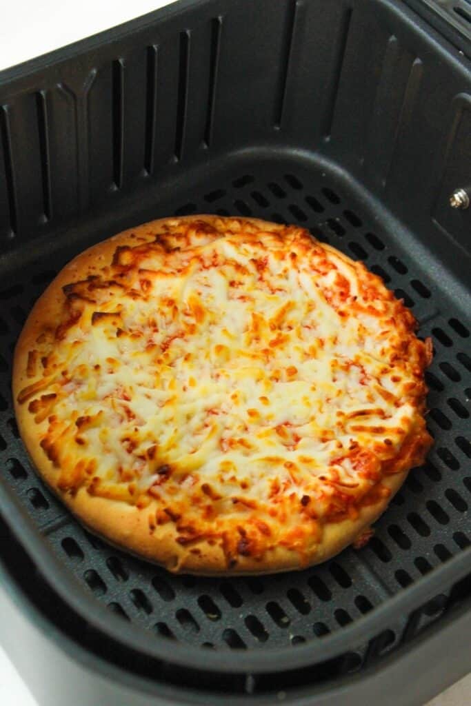 Cooked frozen pizza in air fryer