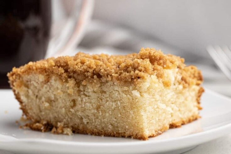 Closeup of a piece of the Bisquick Coffee Cake recipe on a white plate