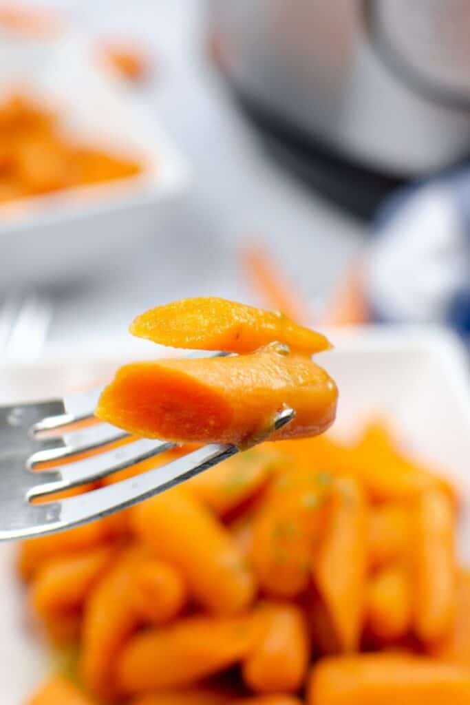 Closeup of the glazed carrot recipe on a fork 