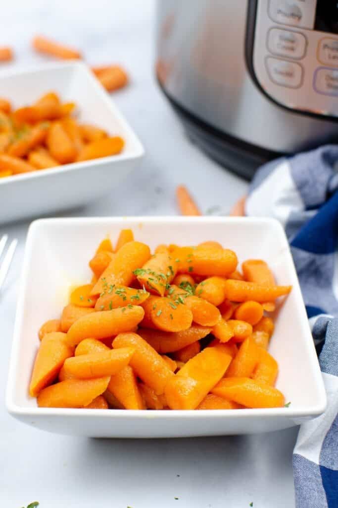 Instant Pot Glazed Carrots recipe in a white square bowl