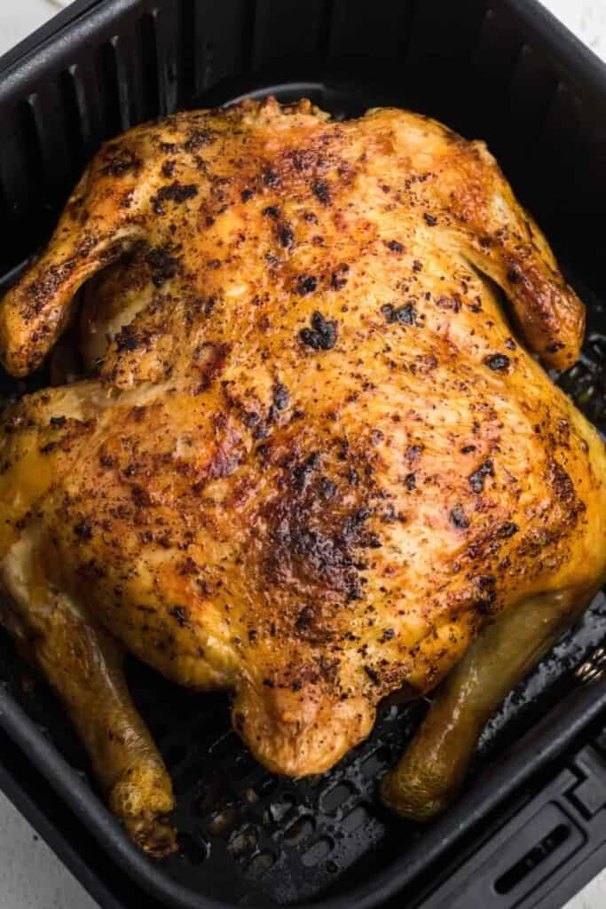 Seasoned whole chicken in air fryer