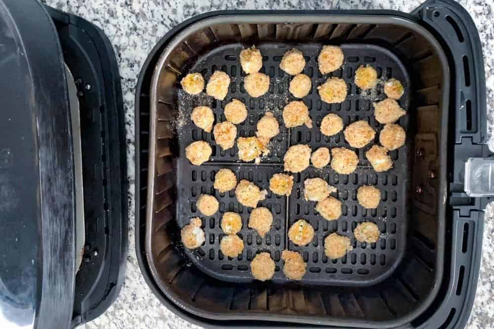 Uncooked breaded okra in air fryer