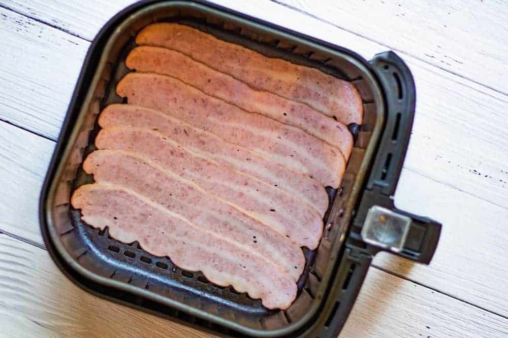 Raw turkey bacon in air fryer.