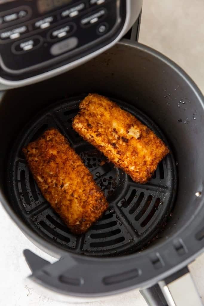 Cooked mahi mahi in the air fryer with a golden brown crusting