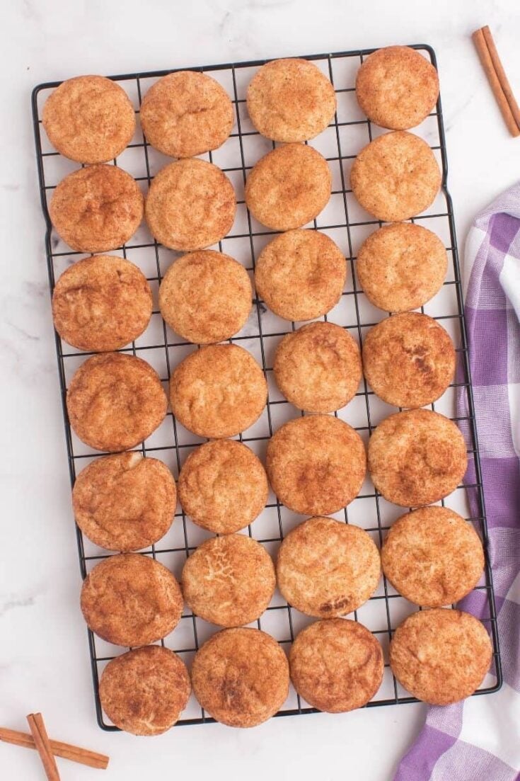 Snickerdoodle cookies on a cooling tray