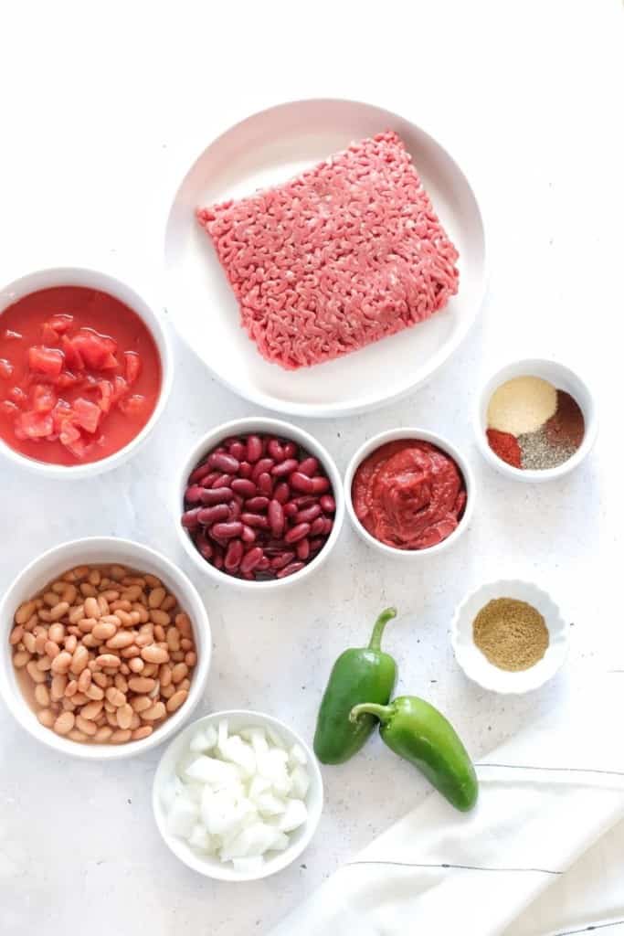 Ingredients needed to make chili in the Ninja Foodi in separate bowls