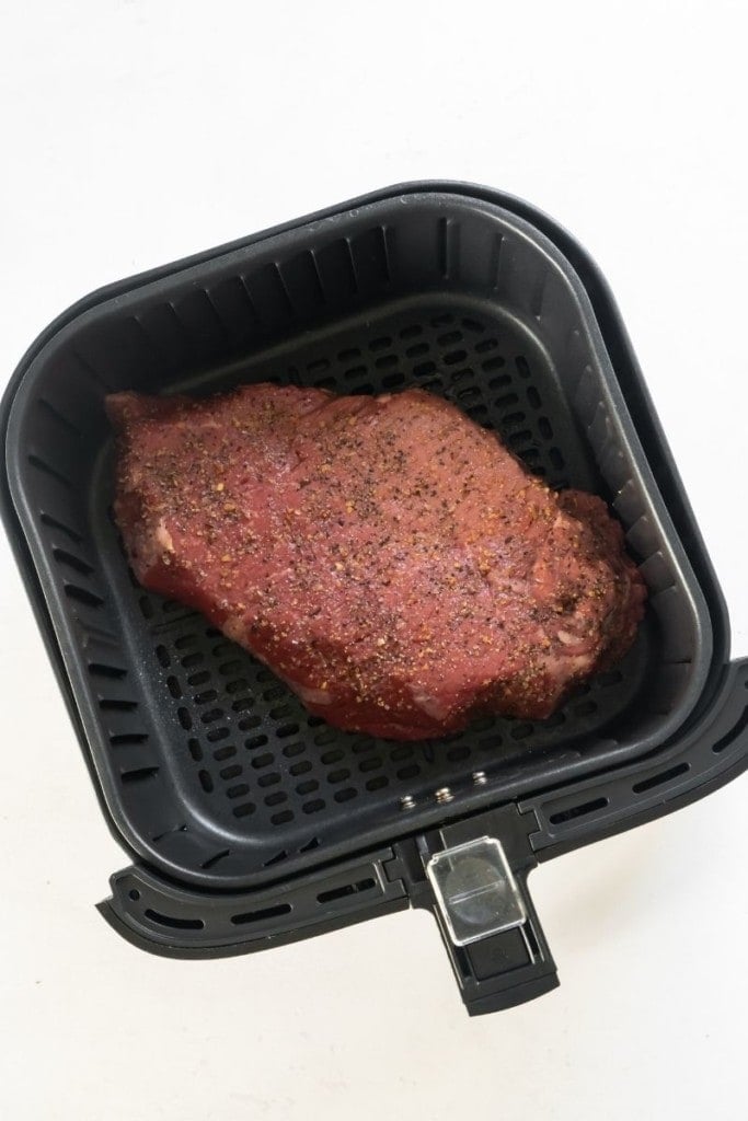 Raw London Broil in air fryer basket