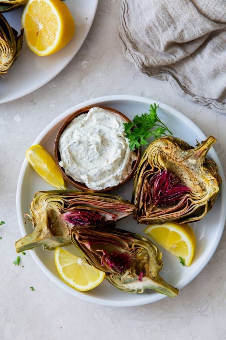 Fresh and cripsy air fryer artichokes with dipping sauce