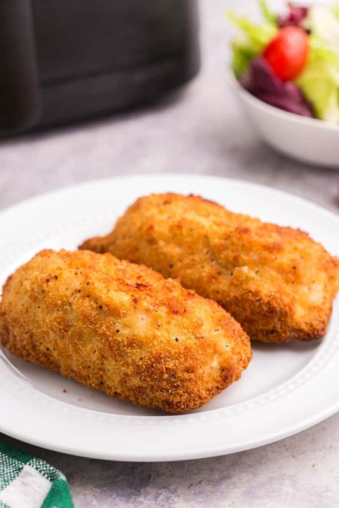 frozen chicken cordon bleu in air fryer served on plate