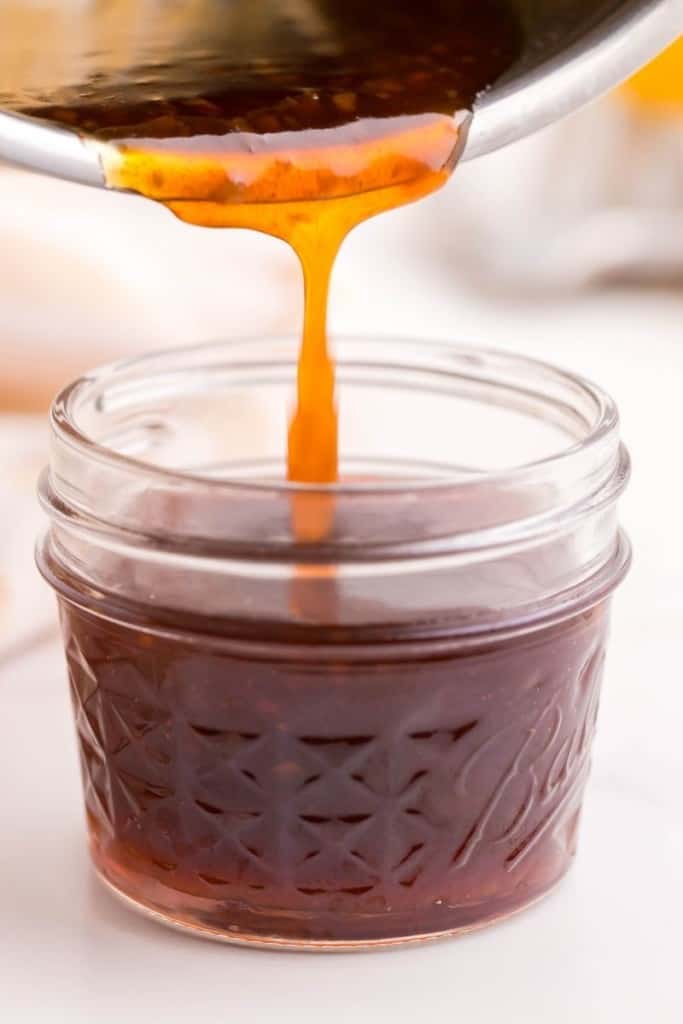 honey sriracha sauce in jar