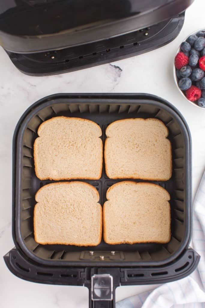 place bread slices in a single layer in air fryer