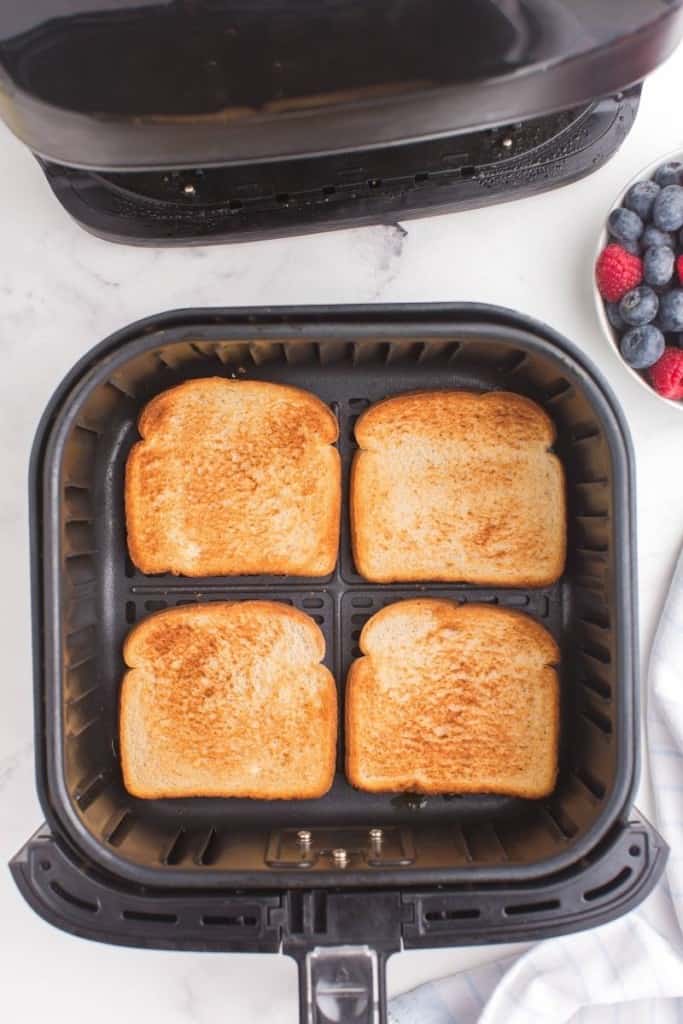 flip bread slices over while cooking in air fryer