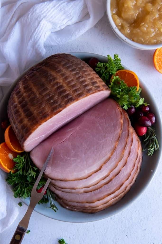 plate with sliced instant pot frozen ham