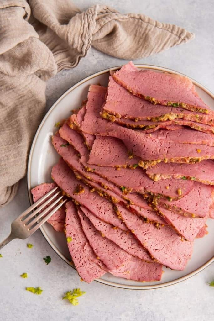 slices of air fryer corned beef on plate