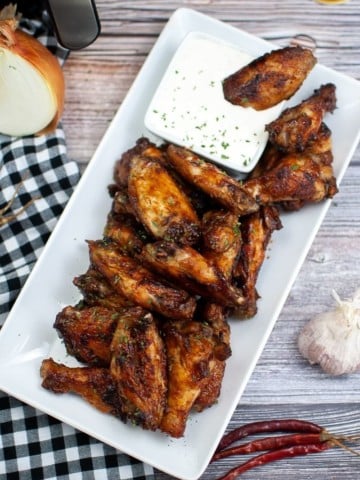air fryer bbq chicken wings on white platter