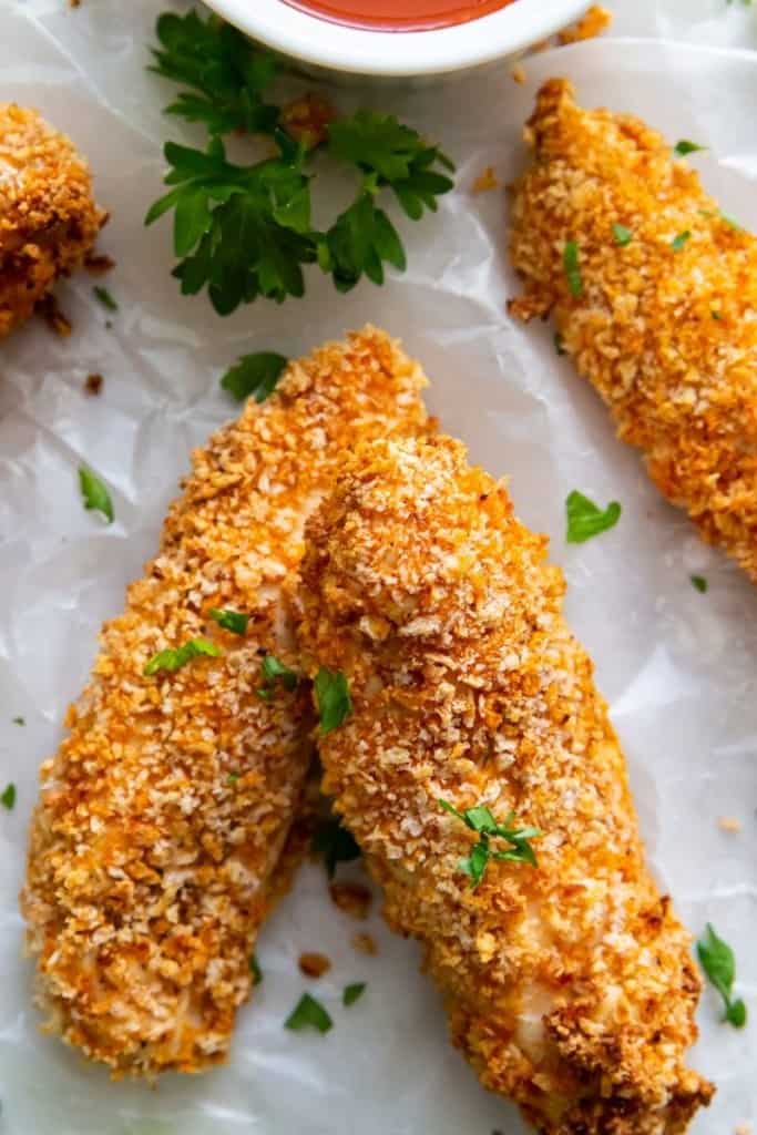 close up of two air fryer buffalo chicken tenders