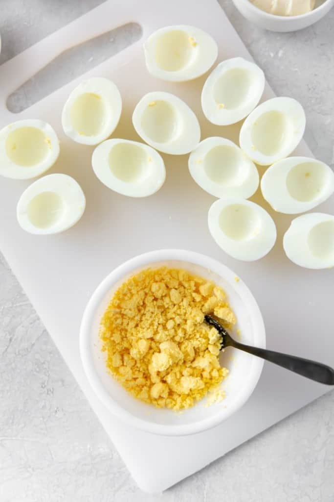 separate hard-boiled egg whites and yolks