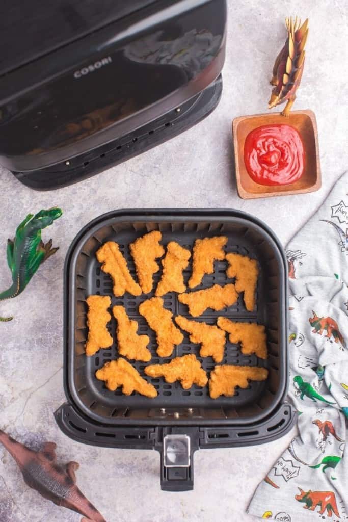 space dino nuggets around air fryer basket