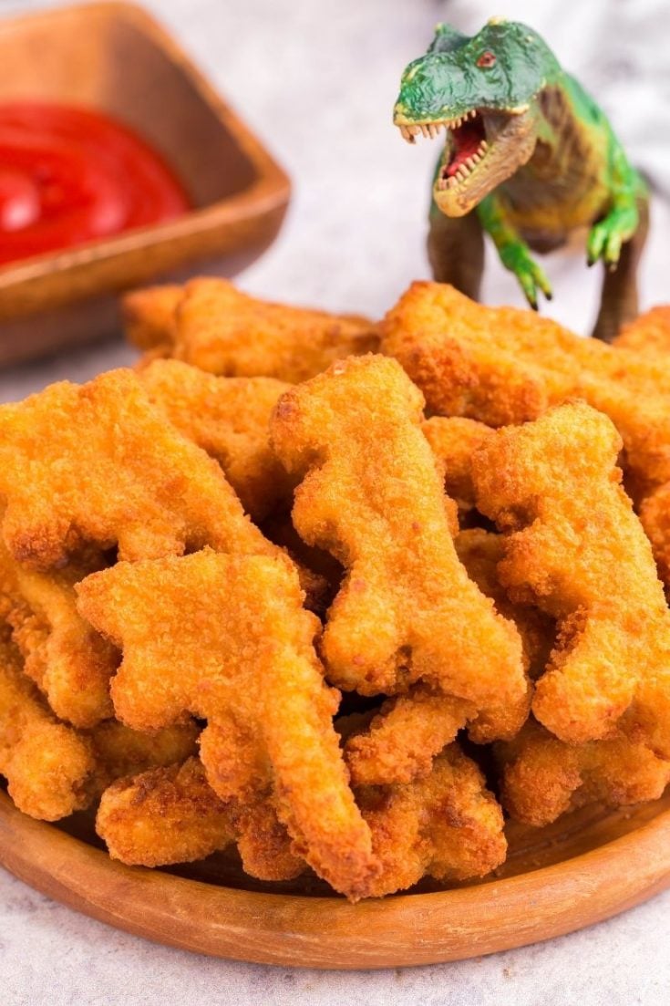 Pile of crispy dino nuggets on a plate