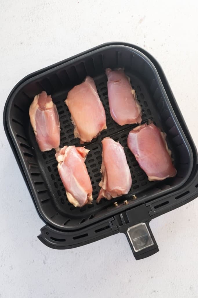 lightly thaw frozen chicken thighs in air fryer