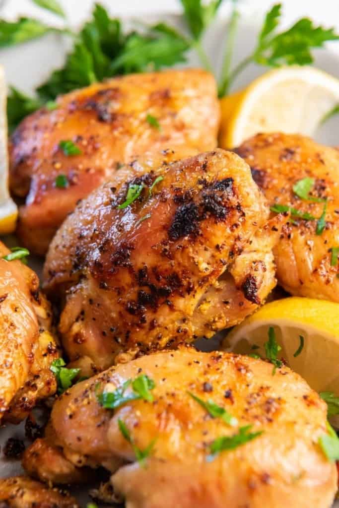 seasoned chicken thighs on plate