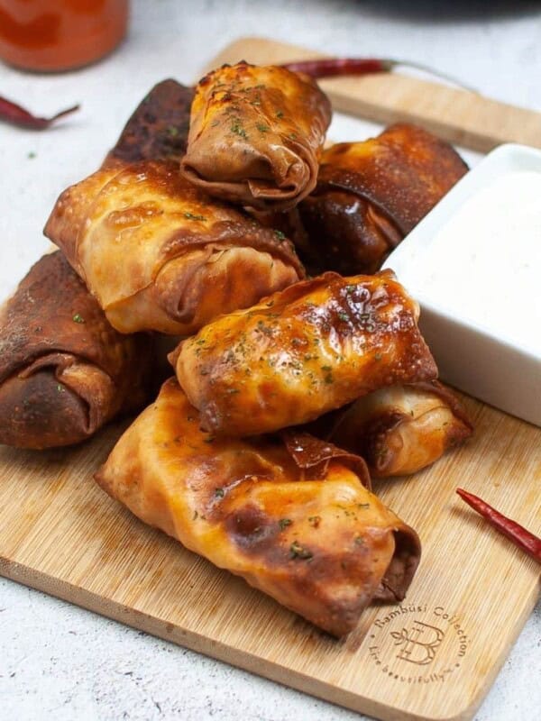Stack of air fryer buffalo chicken egg rolls