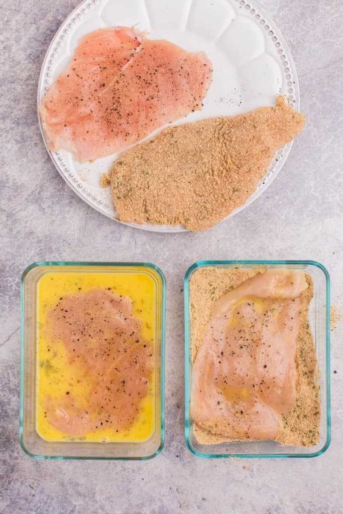 cover chicken cutlets in egg and bread crumbs