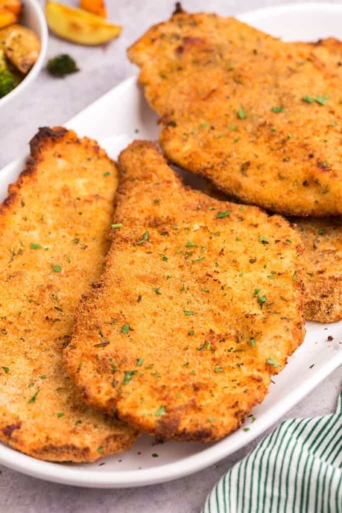 crispy chicken cutlets on plate