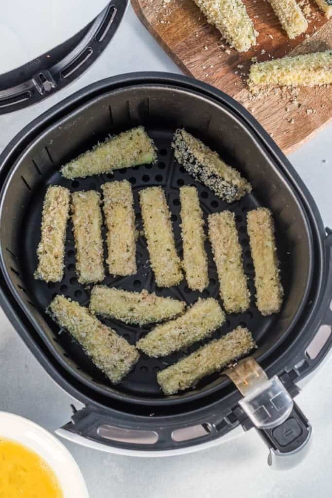 dip sticks in egg and breadcrumb mixtures and place in single layer in air fryer