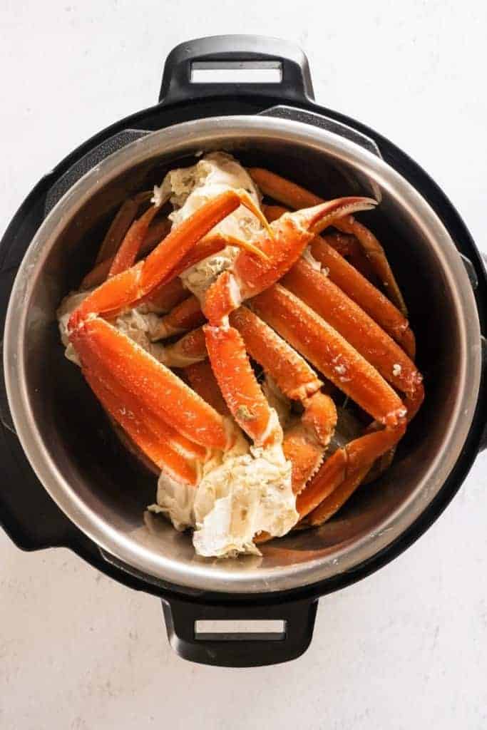 place crab legs on trivet of instant pot